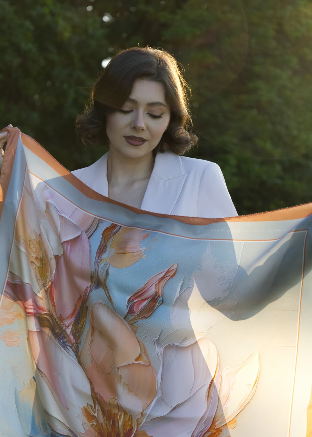 A picture of Maria, the founder of the Marlume brand, showing a medium scarf size.